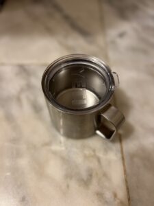 Silver Yeti brand coffee mug.